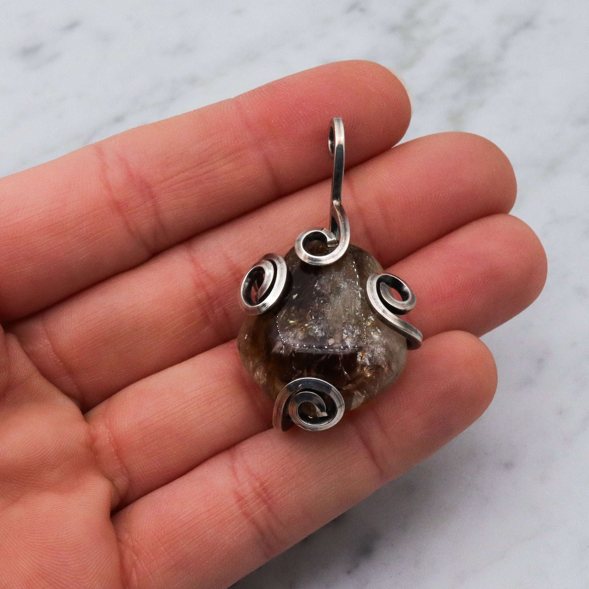 Vintage handmade sterling silver wrapped quartz pendant